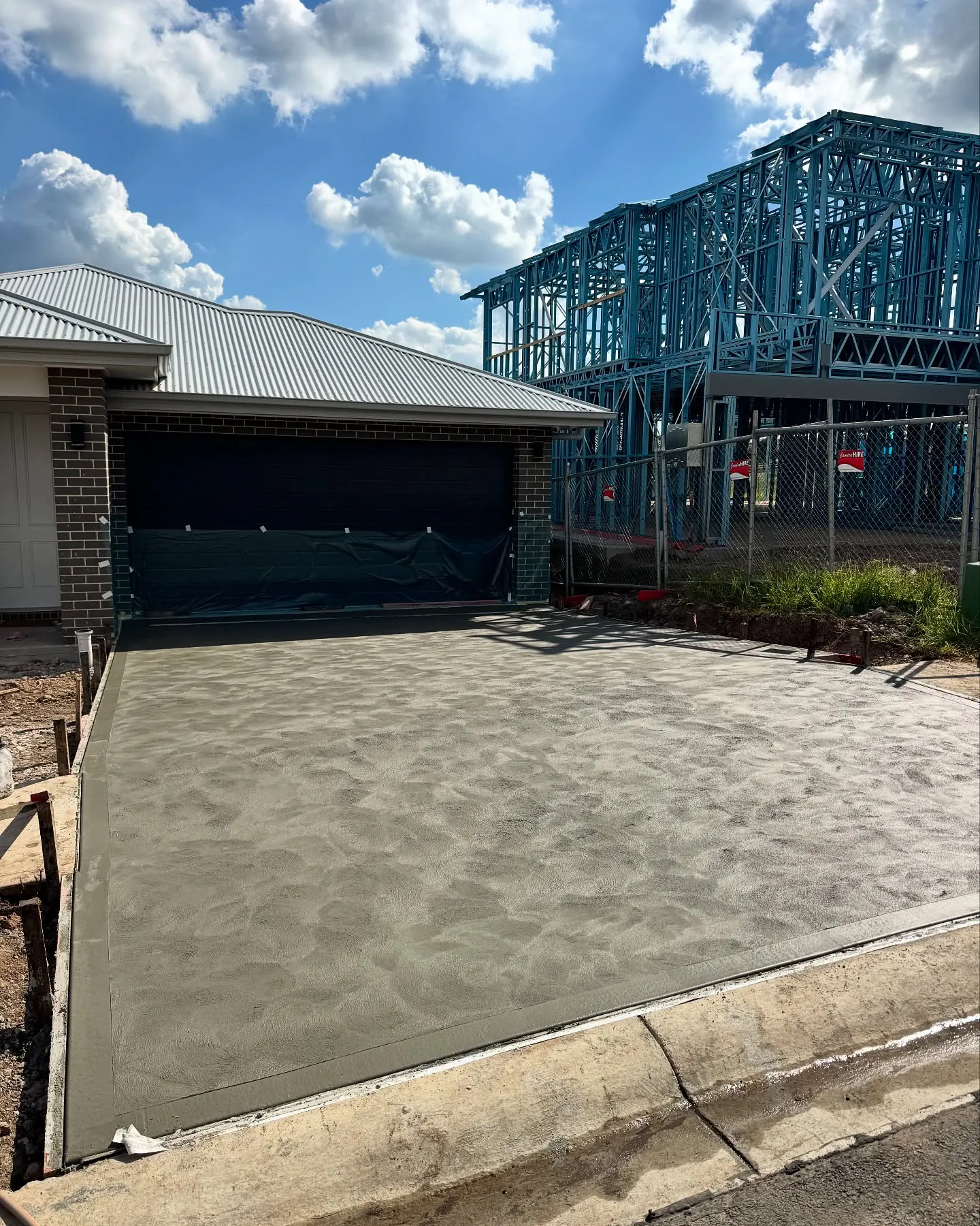 Finished concrete driveway at the new home