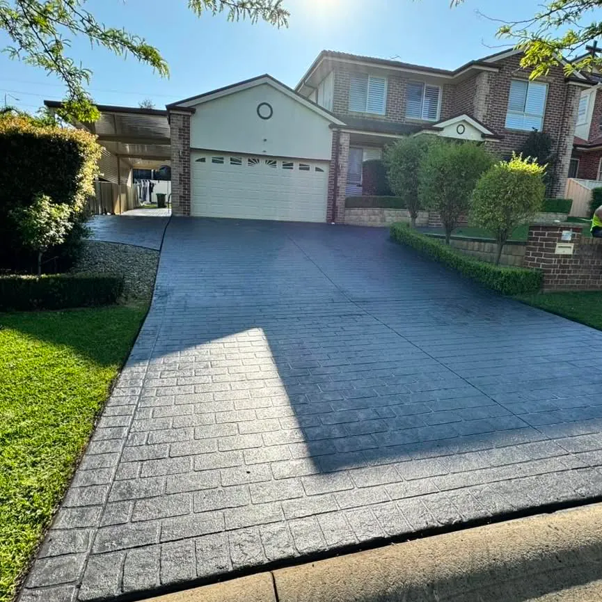 Freshly sealed charcoal driveway